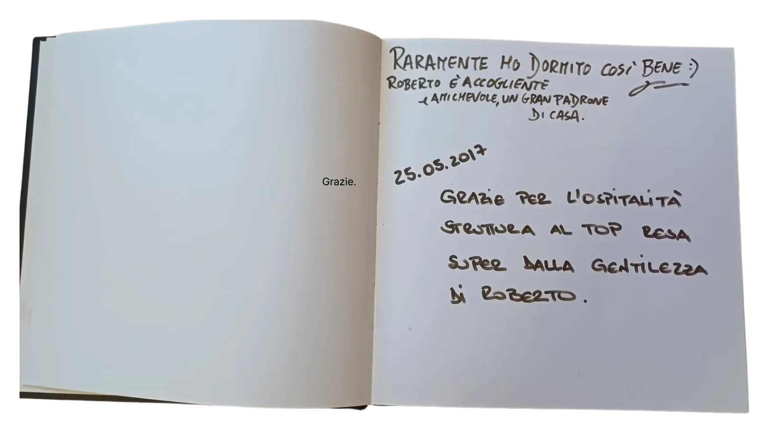 Double page of the guest book: a dedication in Italian from 2017