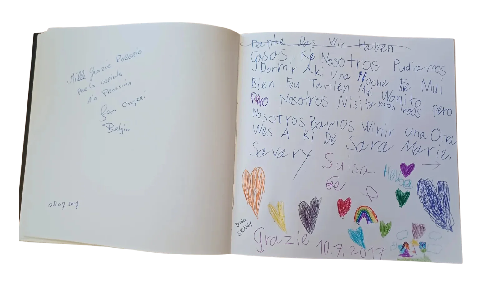 Double page with hearts and a rainbow drawn by children, and a greeting from Belgium