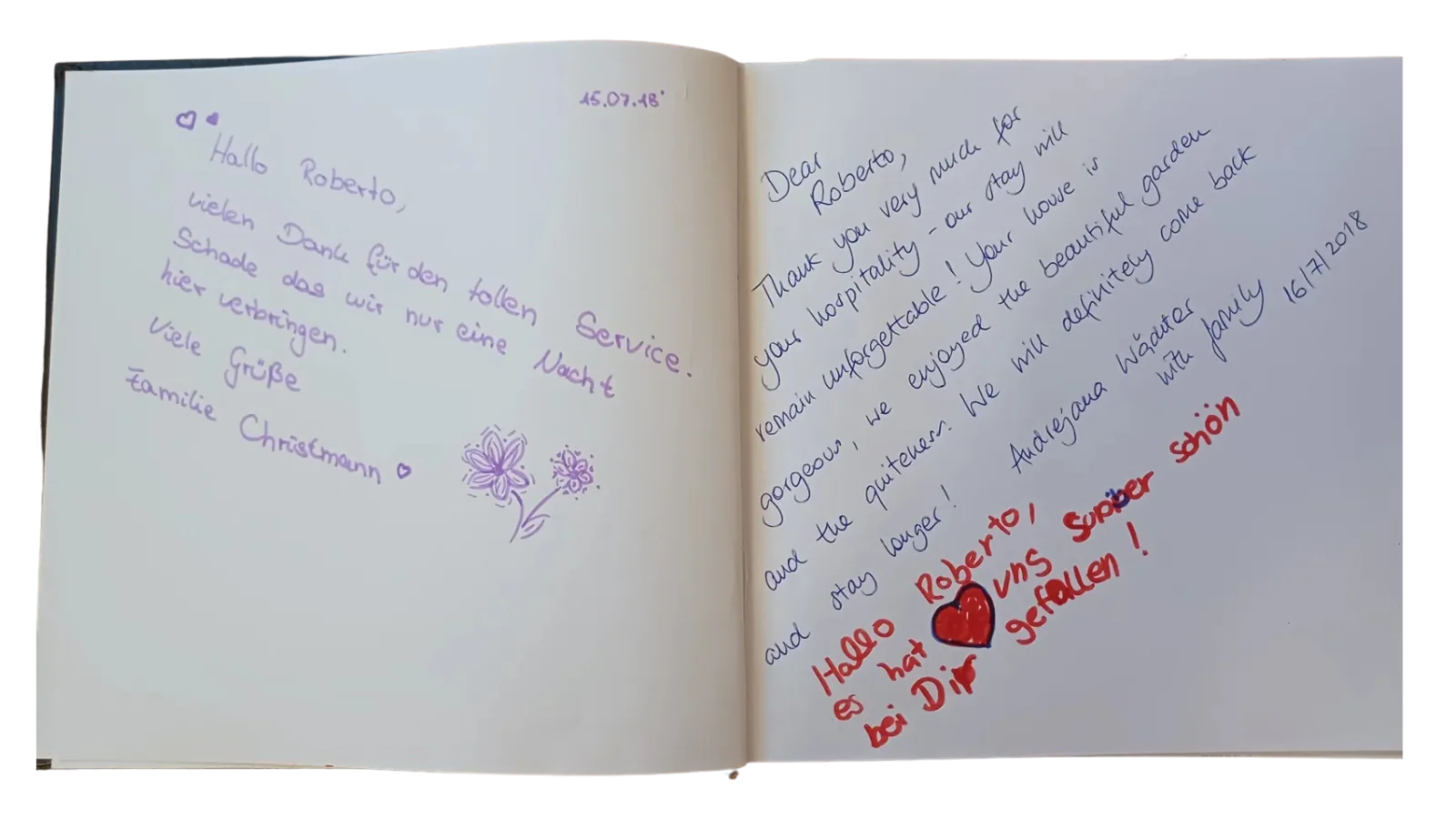 Doppia pagina con un saluto in tedesco e un grande cuore rosso
