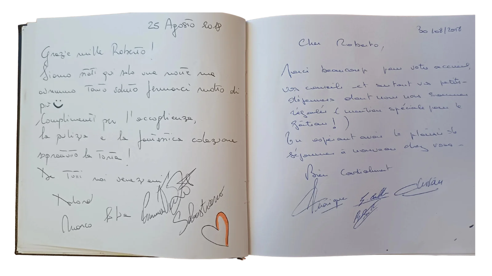 Doppia pagina con saluti in italiano e in francese e un cuore arancione
