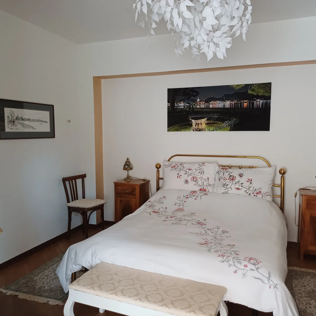 The bedroom with the brass double bed, in Suite Nonna